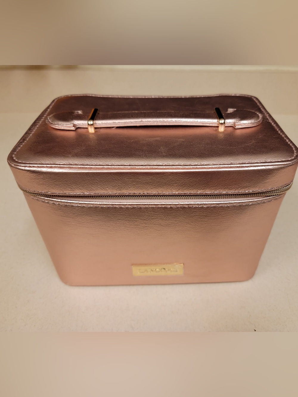 Lancome Metallic Rose Gold Train Case from the 2025 Holiday Beauty Box